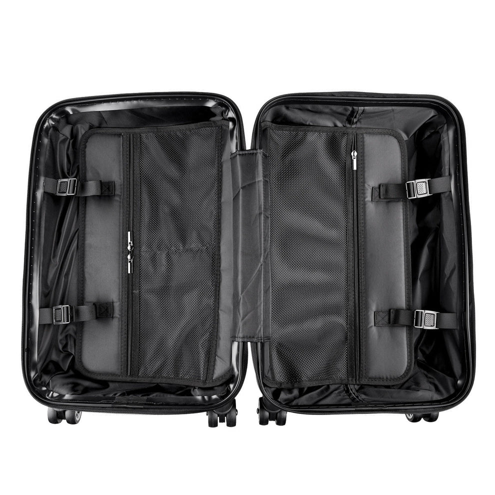 Black suitcase with open compartments on a white background
