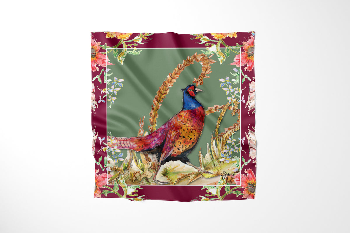 Whimsical Pheasant Scarf by Claire Louise, a cock pheasant among golden wheat on sage green with a burgundy floral border
