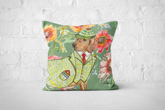 Decorative pillow with a dog in a green outfit and hat on a white background