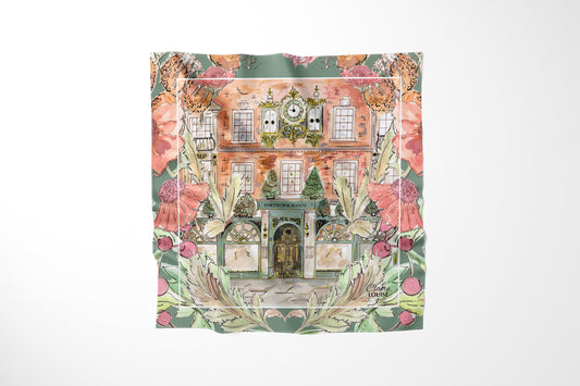 Fortnums In Full Bloom Scarf by Claire Louise: watercolour of the Fortnum & Mason Piccadilly store and clock framed by pink peonies and sage green foliage