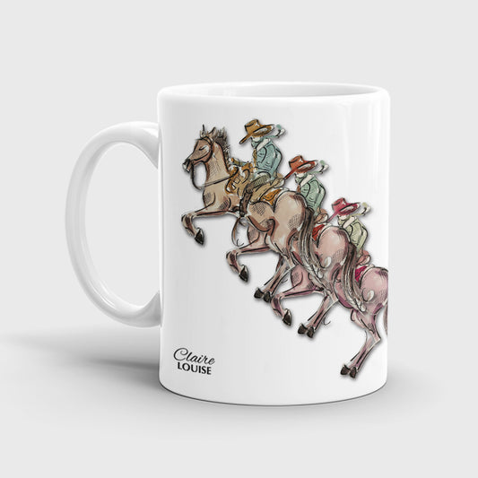 A white ceramic mug featuring an illustration of three cowboys. 